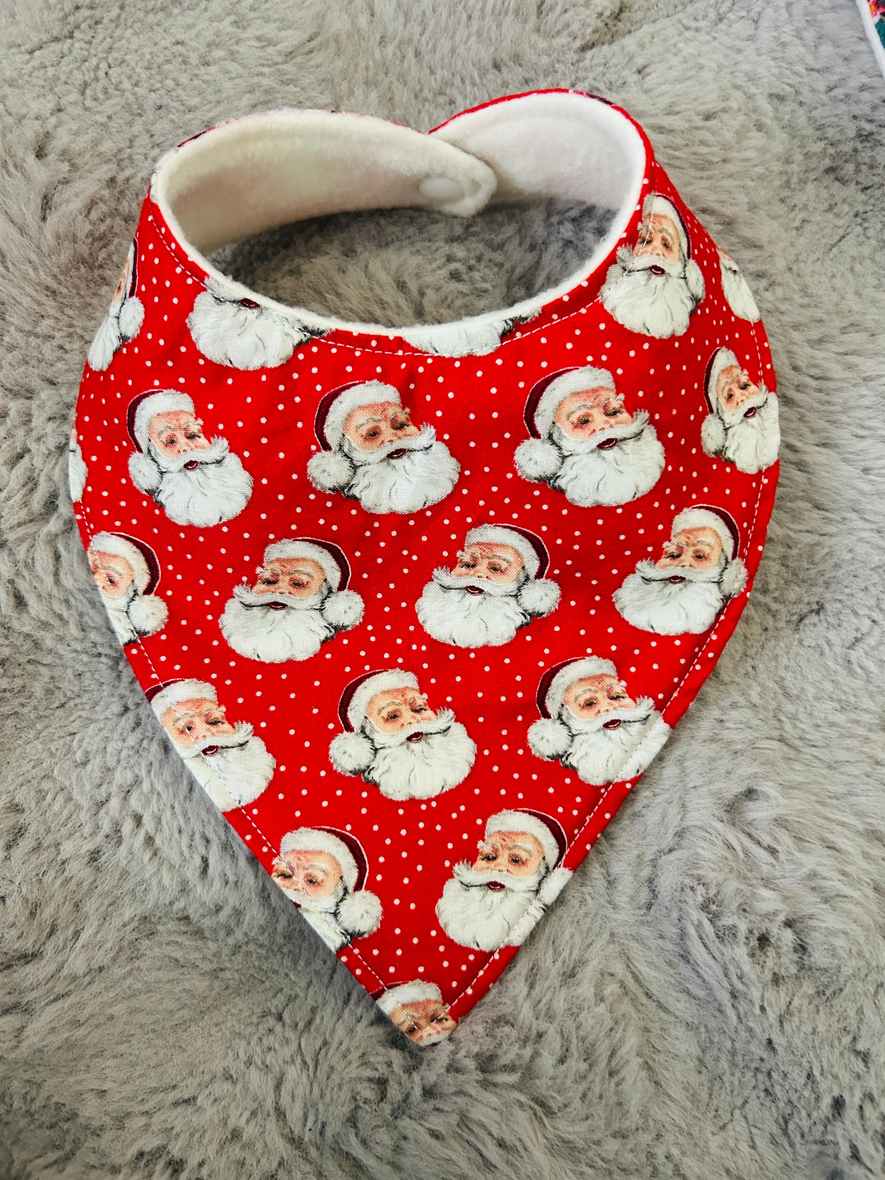Santa faces dribble bib