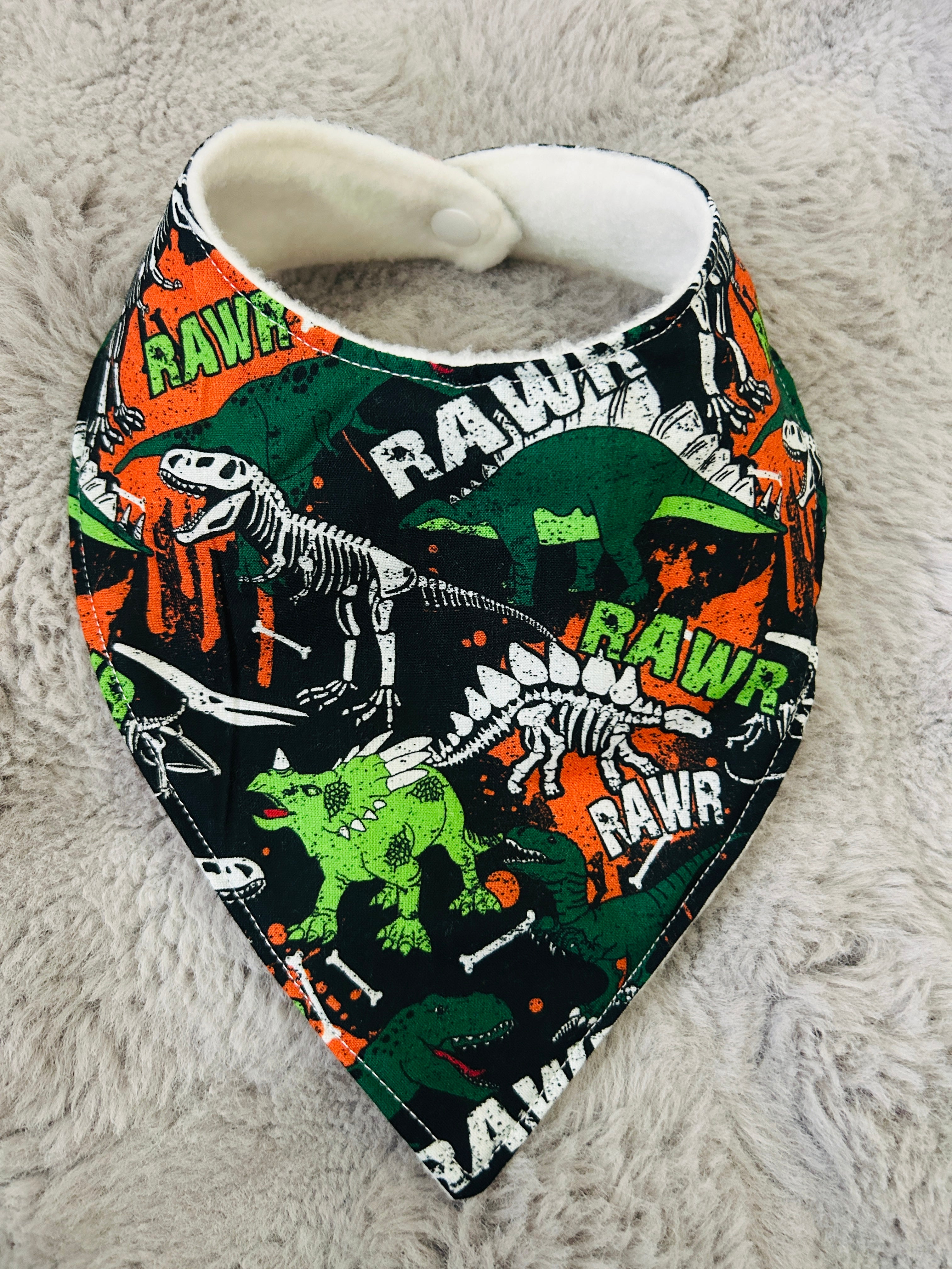 Rawr dinosaurs dribble bib