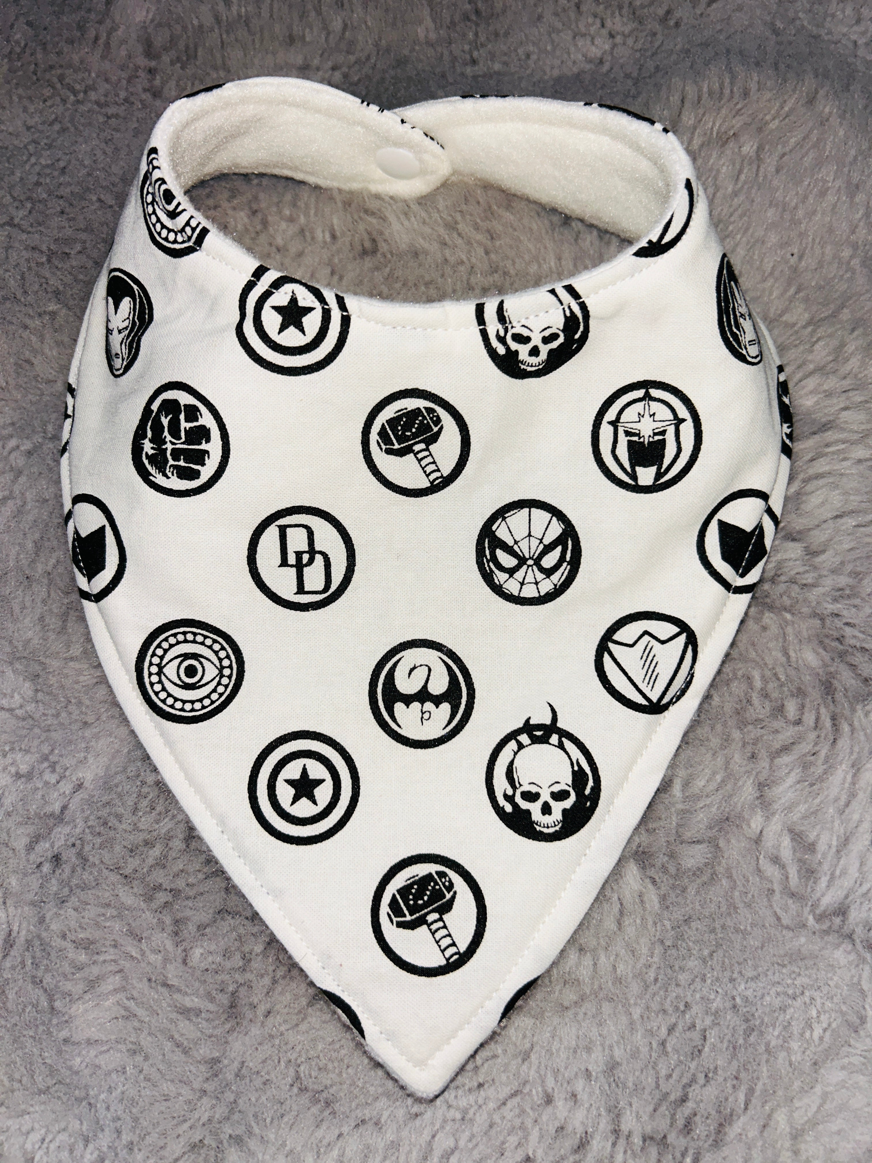 White superhero badges dribble bib