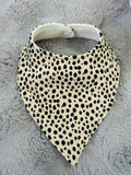 Beige spotty dribble bib