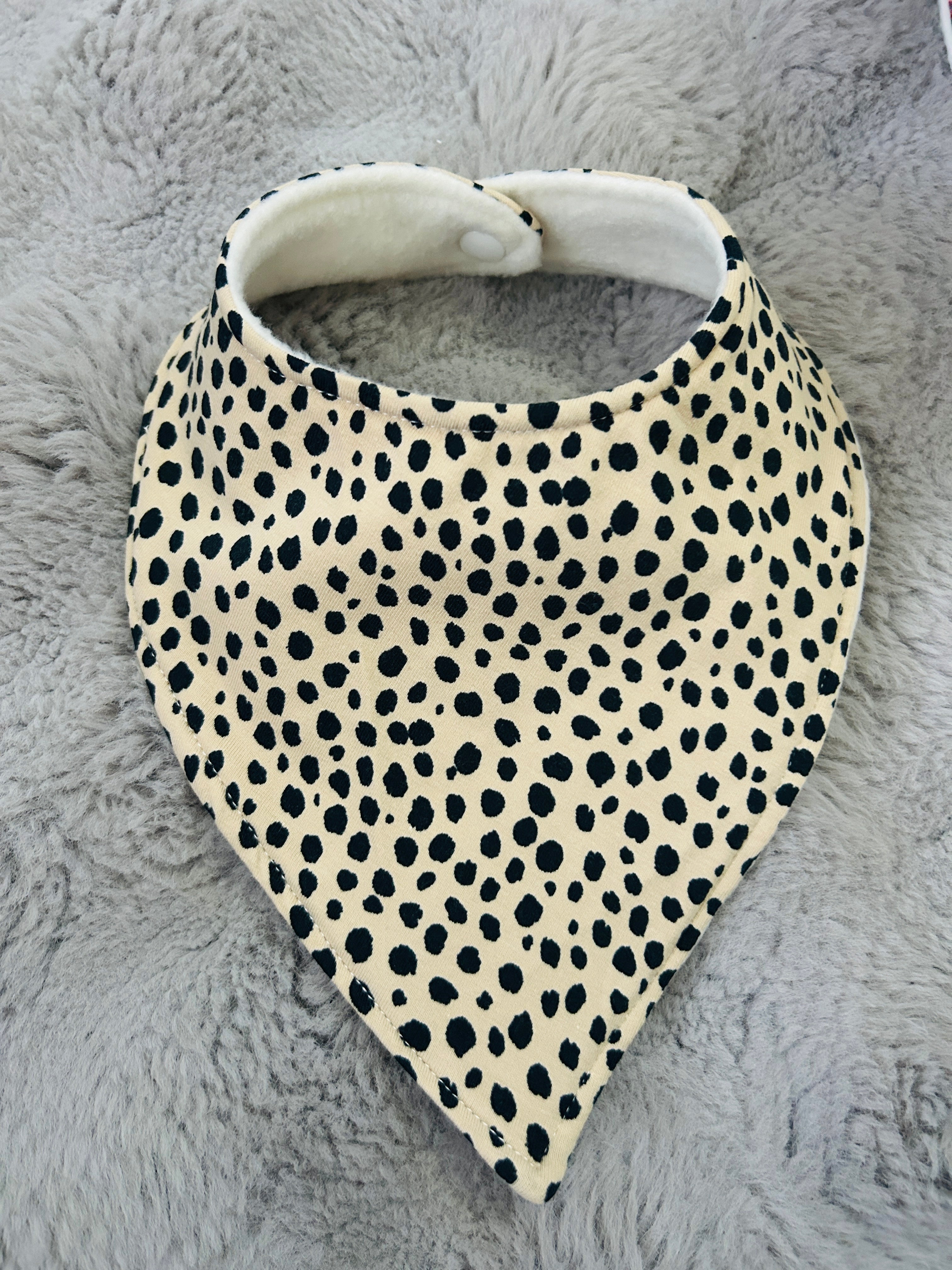 Beige spotty dribble bib